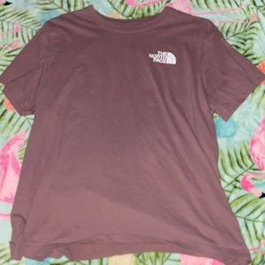 Purple north face shirt. some little stains but still good condition